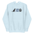 Law of the Paw® logo with seated dog and paw print on a pullover hoodie in sky blue, front view – Kate Spain design
