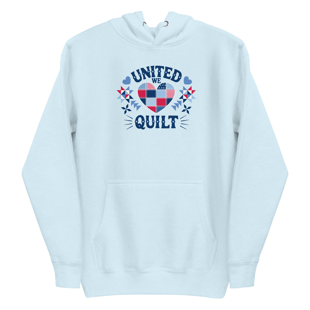 United We Quilt patchwork heart with quilt stars on a premium hoodie in sky blue, front view – Kate Spain design for Pat Sloan