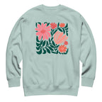 Botanica modern floral design with pink and coral blooms on a crewneck sweatshirt in agave, front view – Kate Spain design