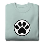 Law of the Paw® cat paw print on a crewneck sweatshirt in agave, folded close-up of the design – Kate Spain design