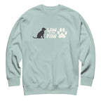 Law of the Paw® logo with seated dog and paw print on a crewneck sweatshirt in agave, front view – Kate Spain design