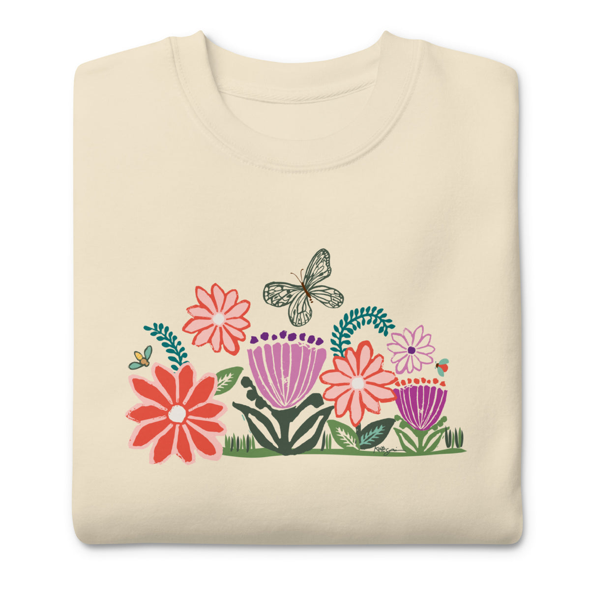 Bloom woodblock-style flowers with a butterfly, ladybug and bee on a crewneck sweatshirt in vintage white, folded close-up of the design – Kate Spain design