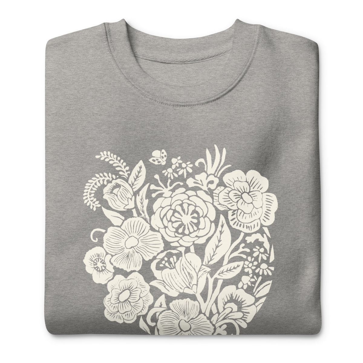 Meadowsweet woodblock-style bouquet of wildflowers on a crewneck sweatshirt in athletic grey, folded close-up of the design – Kate Spain design