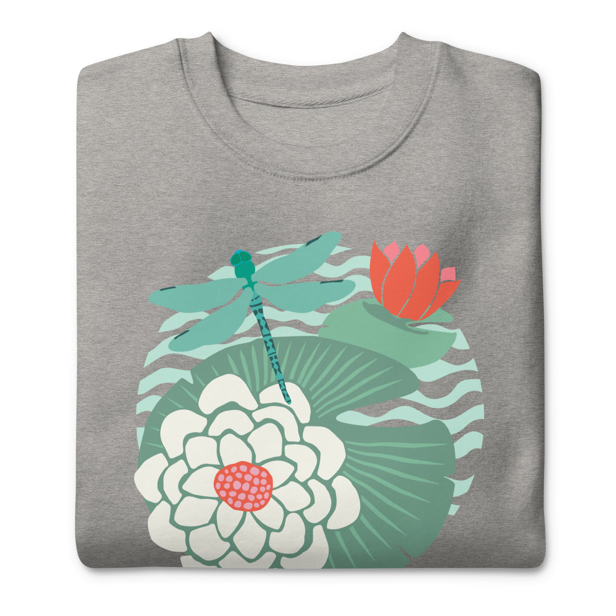 Dragonfly over water lilies and lily pads on a crewneck sweatshirt in athletic grey, folded close-up of the design – Kate Spain design
