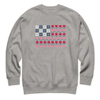 United We Quilt patchwork flag with quilt-block stars and heart stripes on a crewneck sweatshirt in athletic grey, front view – Kate Spain design for Pat Sloan