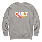 Moda QUILT logo with orange, pink, blue and yellow rays on a premium sweatshirt in athletic grey, front view – Kate Spain design