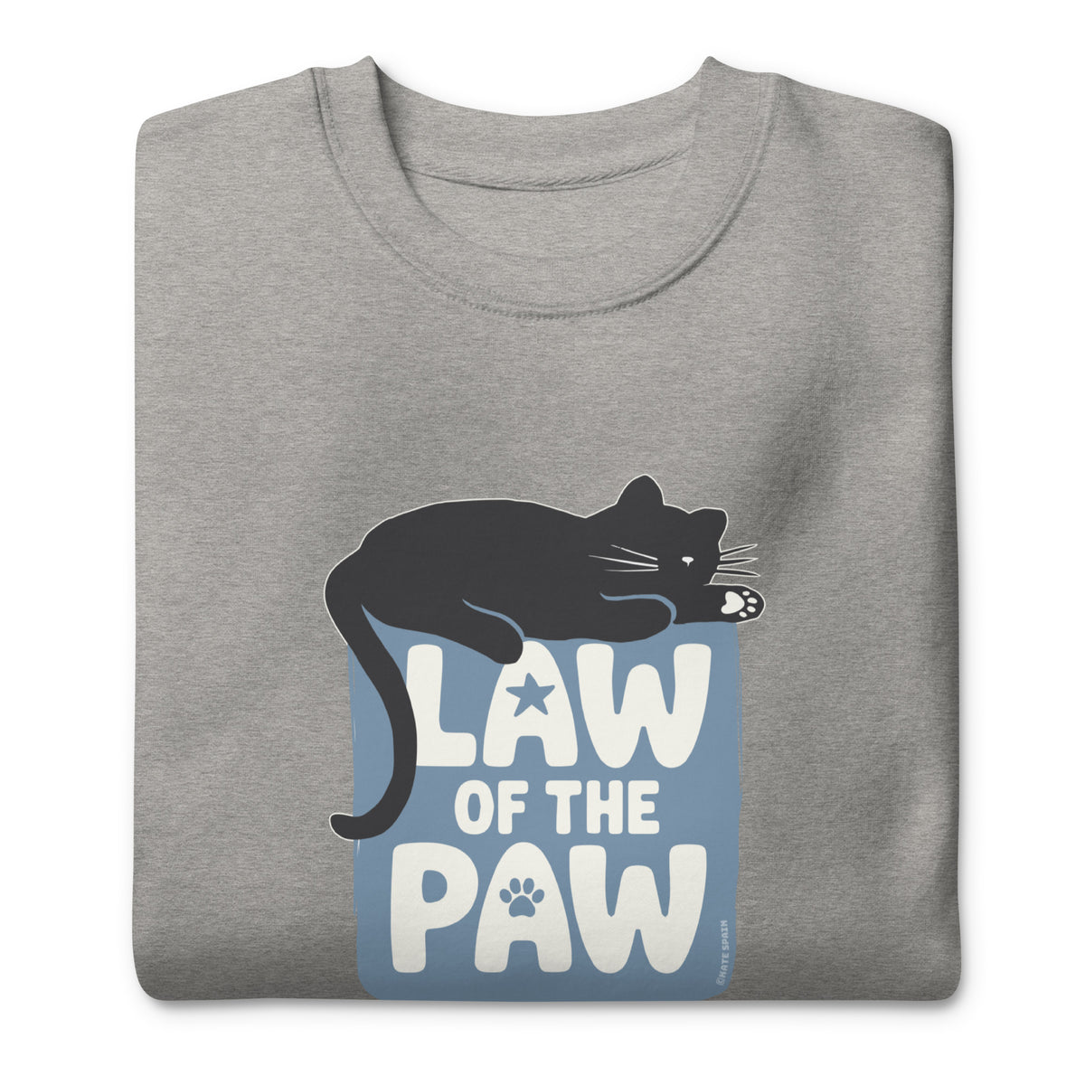 Law of the Paw® design with a cat napping on the logo on a crewneck sweatshirt in athletic grey, folded close-up of the design – Kate Spain design