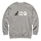 Law of the Paw® logo with seated dog and paw print on a crewneck sweatshirt in athletic grey, front view – Kate Spain design