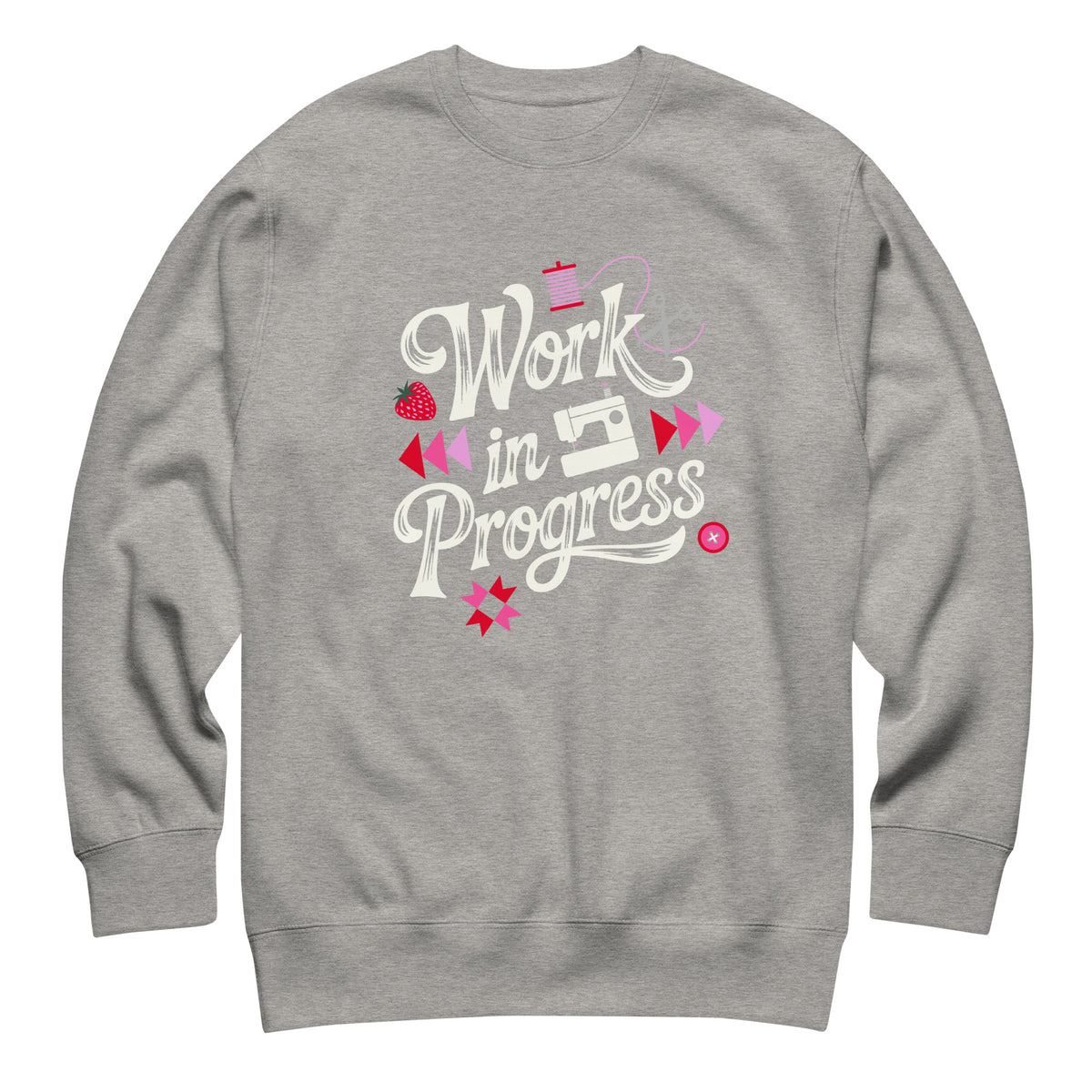 Work in Progress script lettering with sewing icons on a premium sweatshirt in athletic grey, front view – Kate Spain design for Pat Sloan