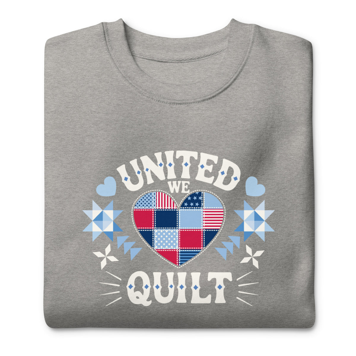 United We Quilt patchwork heart with quilt stars on a premium sweatshirt in athletic grey, folded close-up of the design – Kate Spain design for Pat Sloan