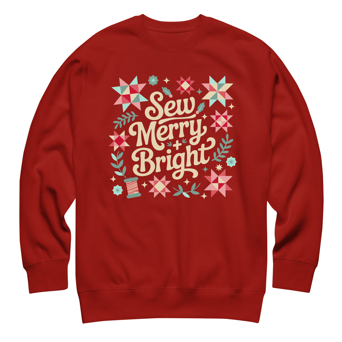 Sew Merry + Bright lettering with quilt stars and holly on a premium sweatshirt in cardinal red, front view – Kate Spain design for Pat Sloan