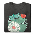 Dragonfly over water lilies and lily pads on a crewneck sweatshirt in charcoal grey, folded close-up of the design – Kate Spain design