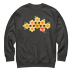 Yellow GeoFlora hexagon flowers in golden yellow, orange, coral and sage on a crewneck sweatshirt in charcoal grey, front view – Kate Spain design for Pat Sloan