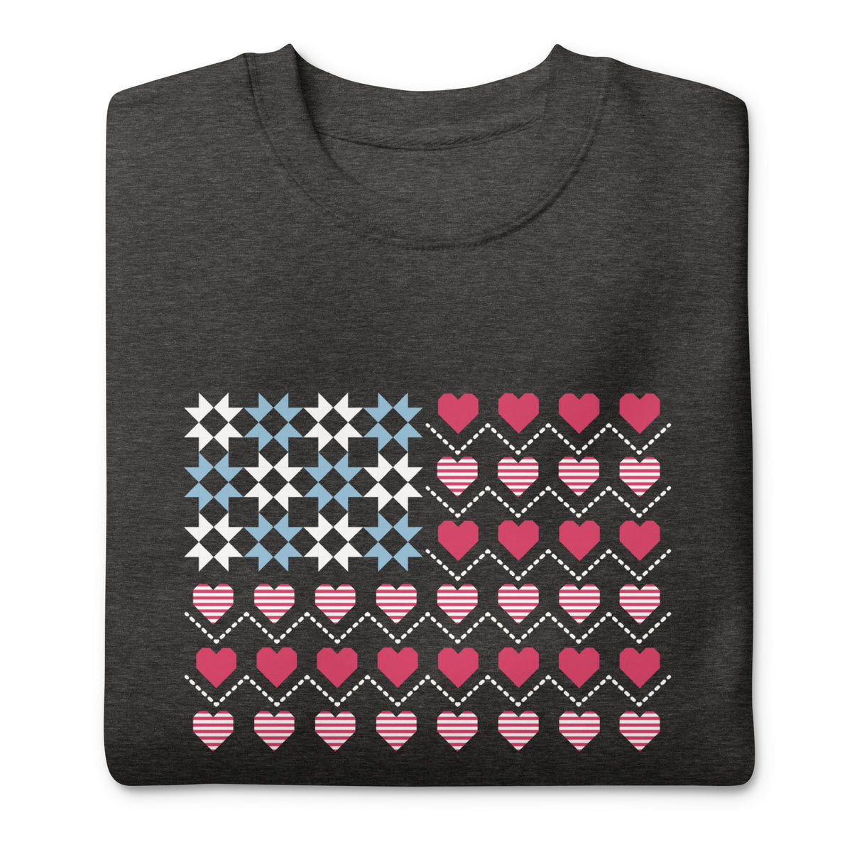 United We Quilt patchwork flag with quilt-block stars and heart stripes on a crewneck sweatshirt in charcoal grey, folded close-up of the design – Kate Spain design for Pat Sloan