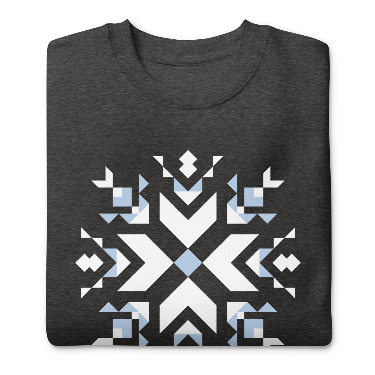 Let It Snow snowflake quilt block on a crewneck sweatshirt in charcoal grey, folded close-up of the design – Kate Spain design for Pat Sloan