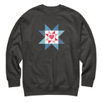 Liberty Love star quilt block with a heart in red, white and blue on a crewneck sweatshirt in charcoal grey, front view – Kate Spain design for Pat Sloan