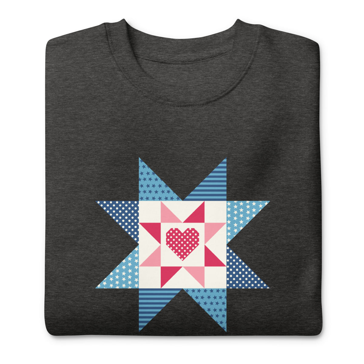 Liberty Love star quilt block with a heart in red, white and blue on a crewneck sweatshirt in charcoal grey, folded close-up of the design – Kate Spain design for Pat Sloan