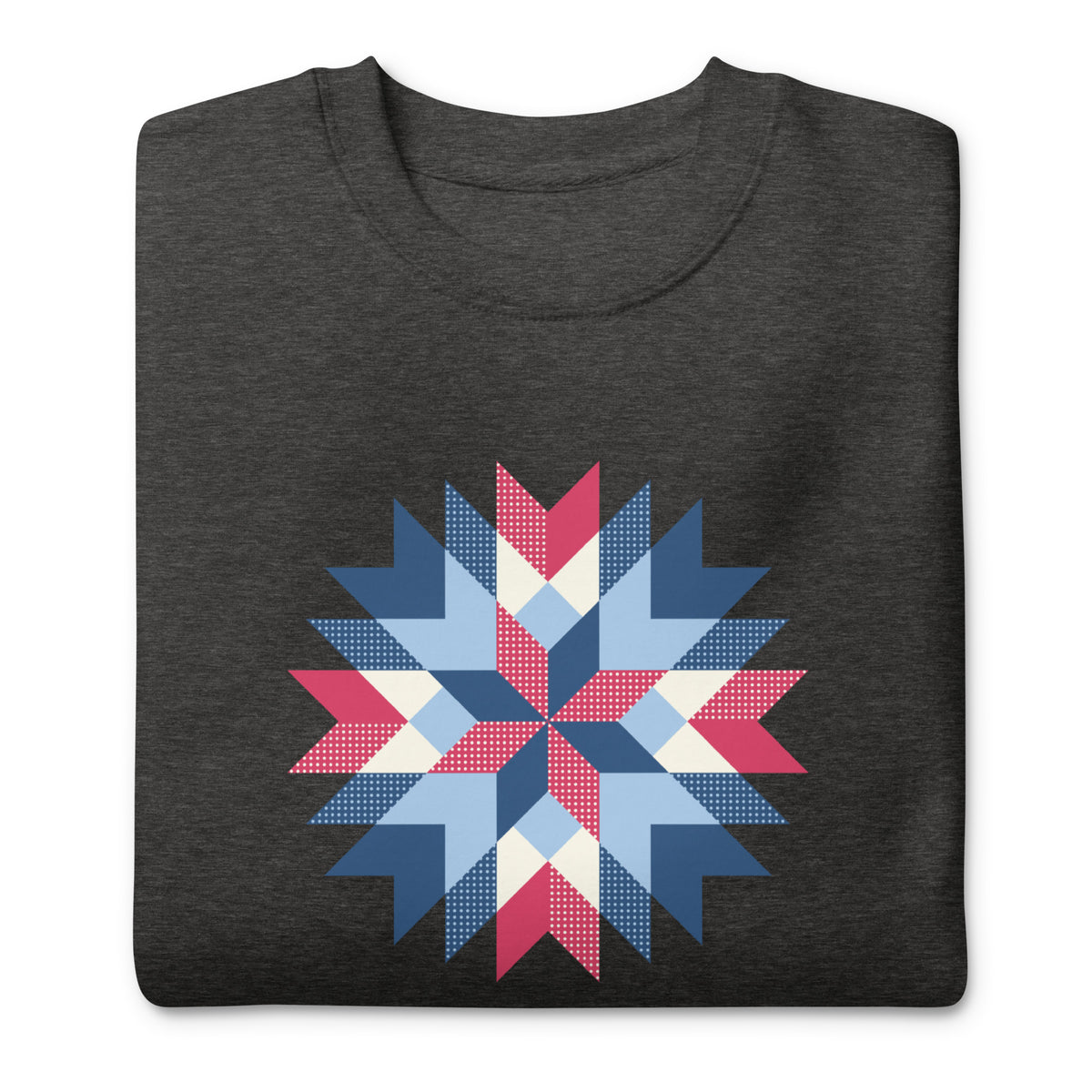 Barn Star quilt block in red, white and blue on a crewneck sweatshirt in charcoal grey, folded close-up of the design – Kate Spain design for Pat Sloan