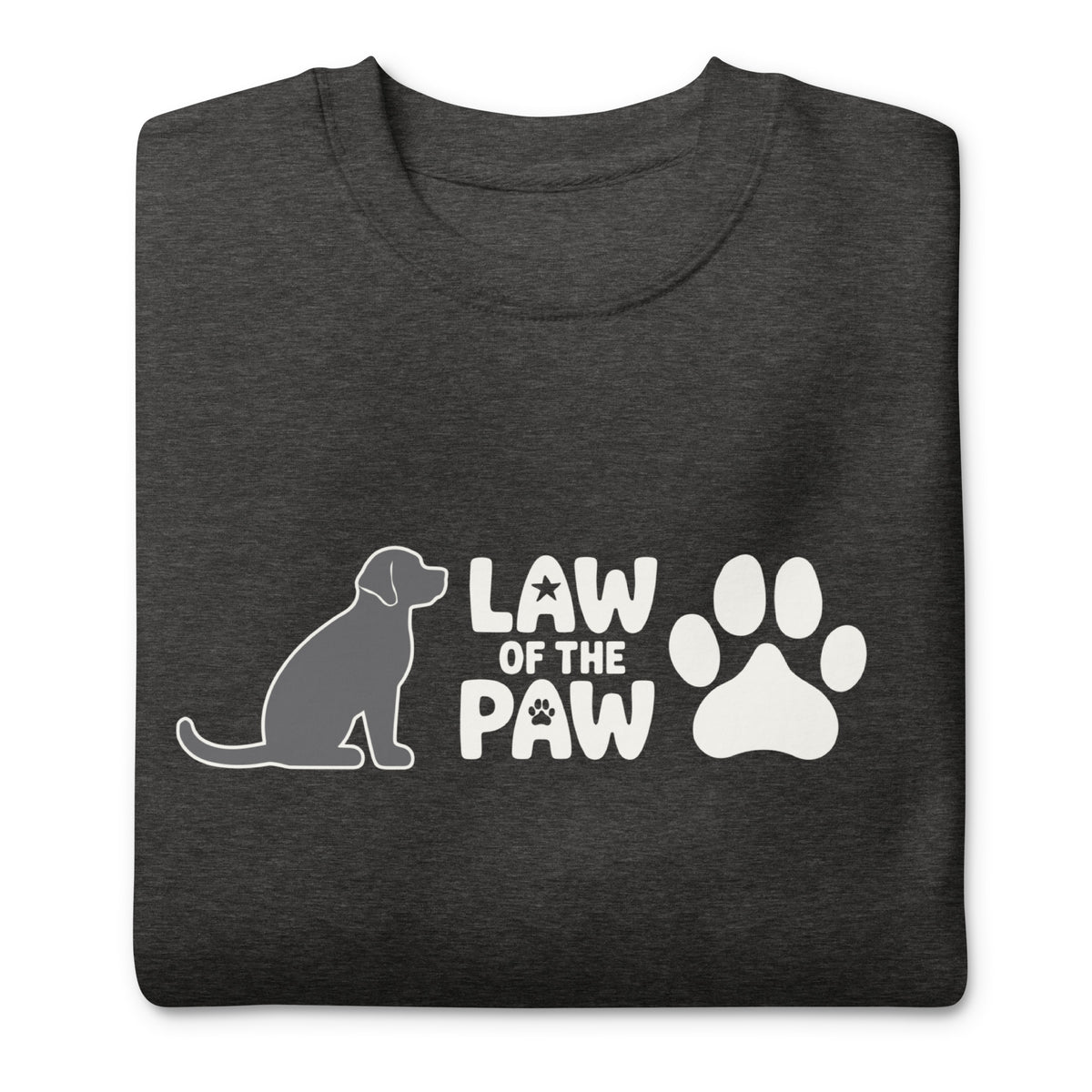 Law of the Paw® logo with seated dog and paw print on a crewneck sweatshirt in charcoal grey, folded close-up of the design – Kate Spain design
