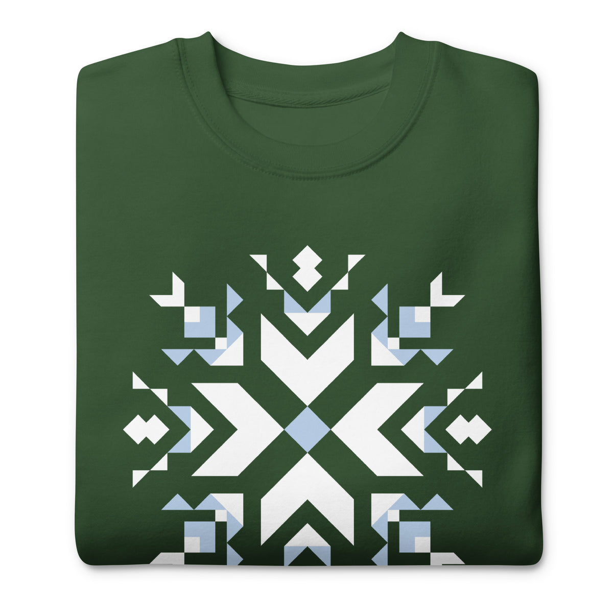 Let It Snow snowflake quilt block on a crewneck sweatshirt in forest green, folded close-up of the design – Kate Spain design for Pat Sloan