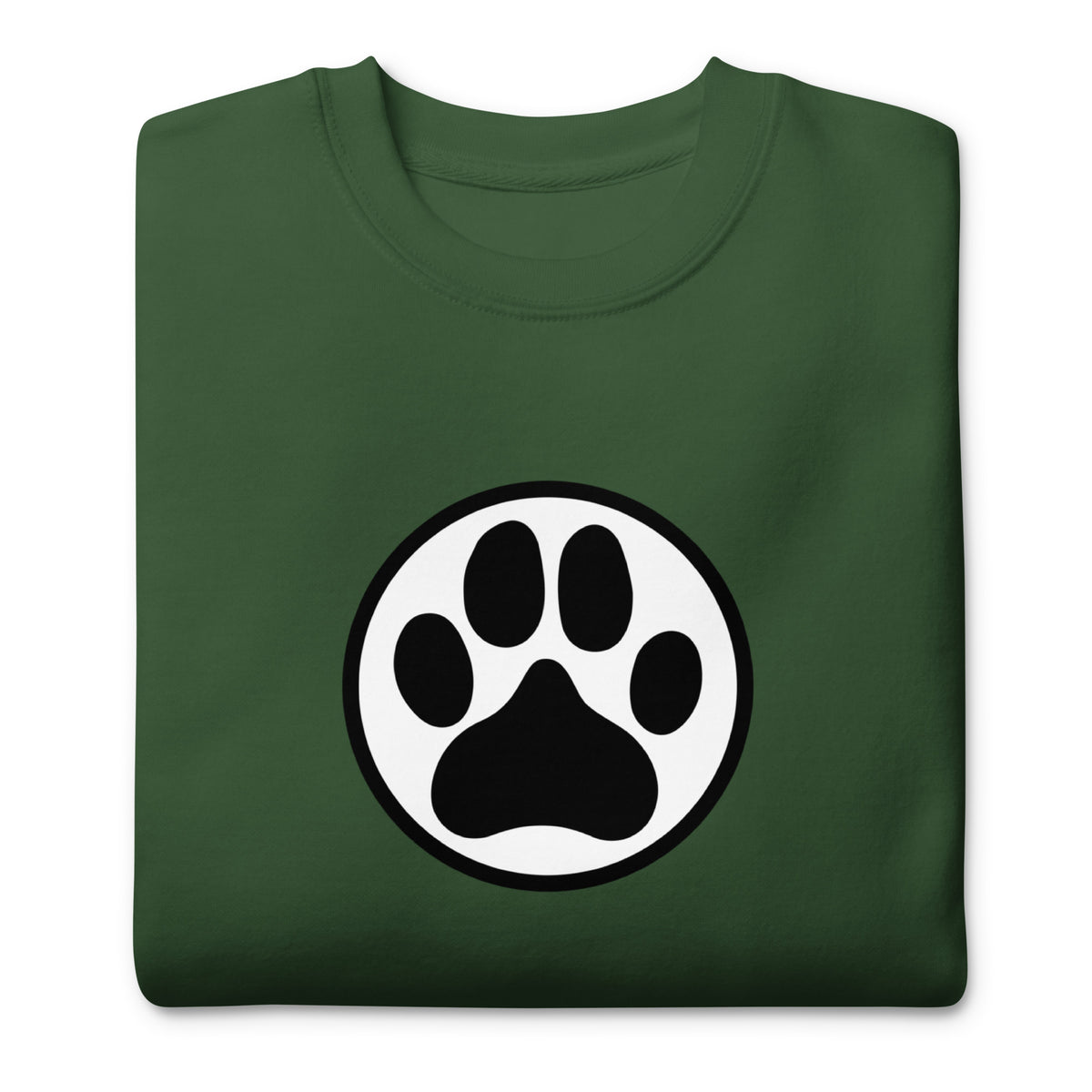 Law of the Paw® dog paw print on a crewneck sweatshirt in forest green, folded close-up of the design – Kate Spain design