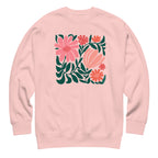 Botanica modern floral design with pink and coral blooms on a crewneck sweatshirt in pink, front view – Kate Spain design
