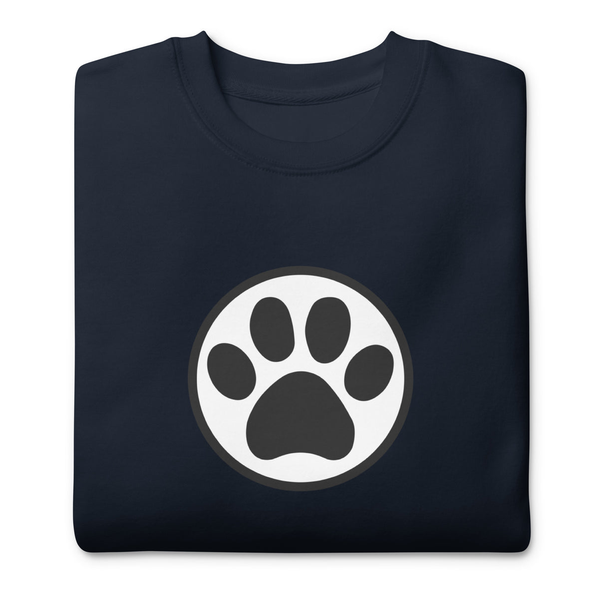 Law of the Paw® cat paw print on a crewneck sweatshirt in navy, folded close-up of the design – Kate Spain design