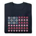 United We Quilt patchwork flag with quilt-block stars and heart stripes on a crewneck sweatshirt in navy, folded close-up of the design – Kate Spain design for Pat Sloan