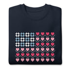 United We Quilt patchwork flag with quilt-block stars and heart stripes on a crewneck sweatshirt in navy, folded close-up of the design – Kate Spain design for Pat Sloan