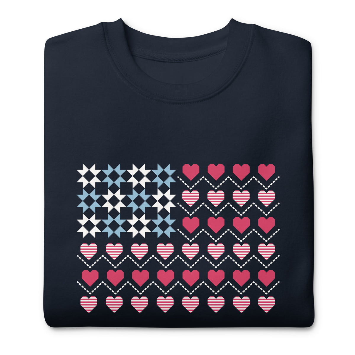 United We Quilt patchwork flag with quilt-block stars and heart stripes on a crewneck sweatshirt in navy, folded close-up of the design – Kate Spain design for Pat Sloan