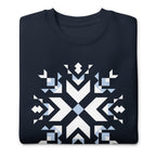Let It Snow snowflake quilt block on a crewneck sweatshirt in navy, folded close-up of the design – Kate Spain design for Pat Sloan