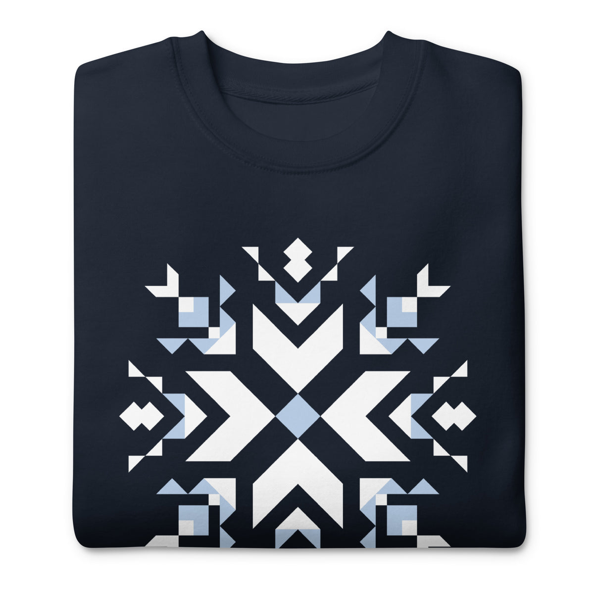 Let It Snow snowflake quilt block on a crewneck sweatshirt in navy, folded close-up of the design – Kate Spain design for Pat Sloan
