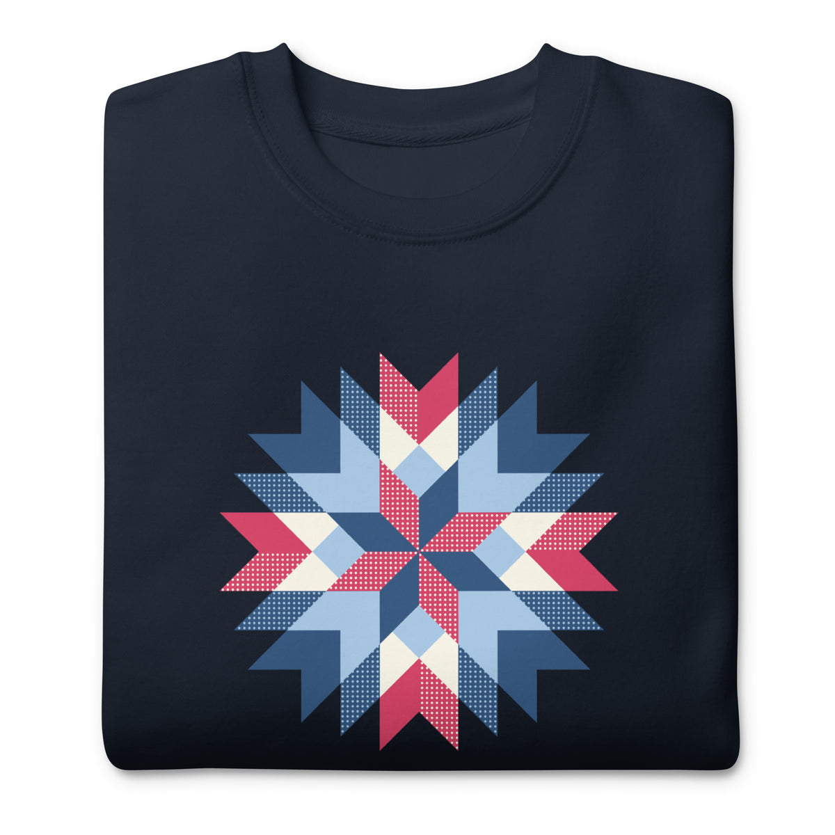Barn Star quilt block in red, white and blue on a crewneck sweatshirt in navy, folded close-up of the design – Kate Spain design for Pat Sloan