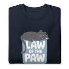 Law of the Paw® design with a cat napping on the logo on a crewneck sweatshirt in navy, folded close-up of the design – Kate Spain design