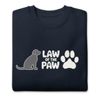 Law of the Paw® logo with seated dog and paw print on a crewneck sweatshirt in navy, folded close-up of the design – Kate Spain design