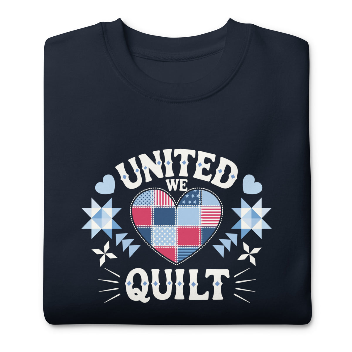 United We Quilt patchwork heart with quilt stars on a premium sweatshirt in navy, folded close-up of the design – Kate Spain design for Pat Sloan