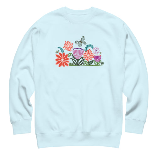 Bloom woodblock-style flowers with a butterfly, ladybug and bee on a crewneck sweatshirt in sky blue, front view – Kate Spain design