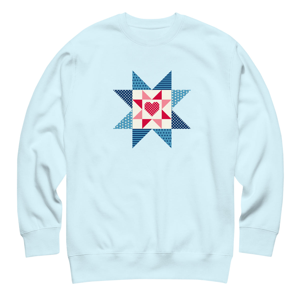 Liberty Love star quilt block with a heart in red, white and blue on a crewneck sweatshirt in sky blue, front view – Kate Spain design for Pat Sloan
