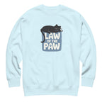 Law of the Paw® design with a cat napping on the logo on a crewneck sweatshirt in sky blue, front view – Kate Spain design