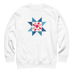 Liberty Love star quilt block with a heart in red, white and blue on a crewneck sweatshirt in white, front view – Kate Spain design for Pat Sloan