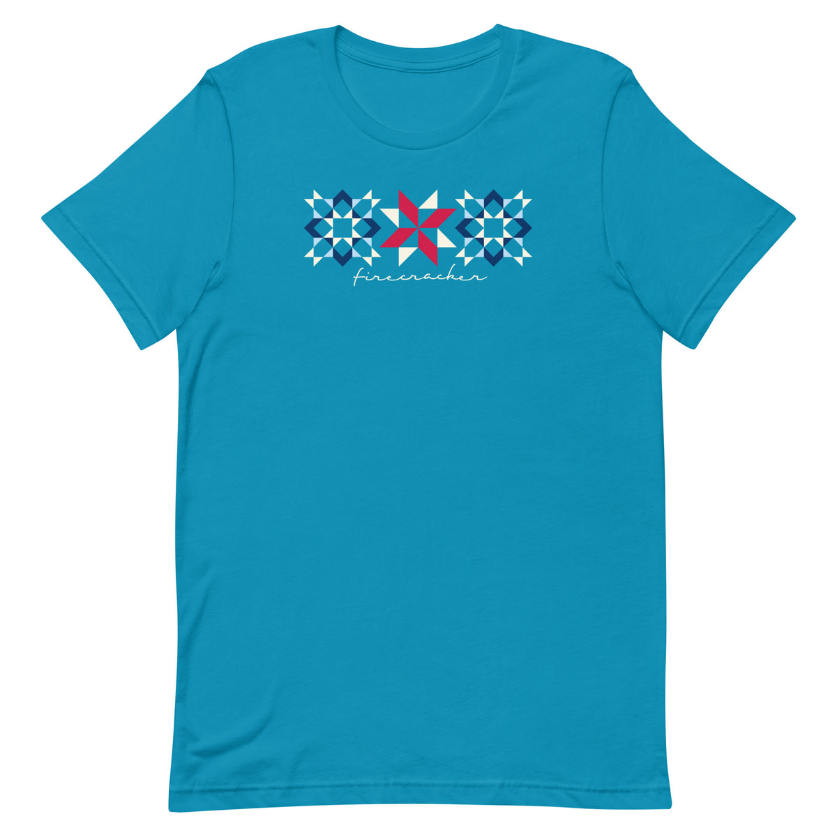 Firecracker quilt-block stars with script lettering in red, white and blue on a t-shirt in aqua, front view – Kate Spain design for Pat Sloan