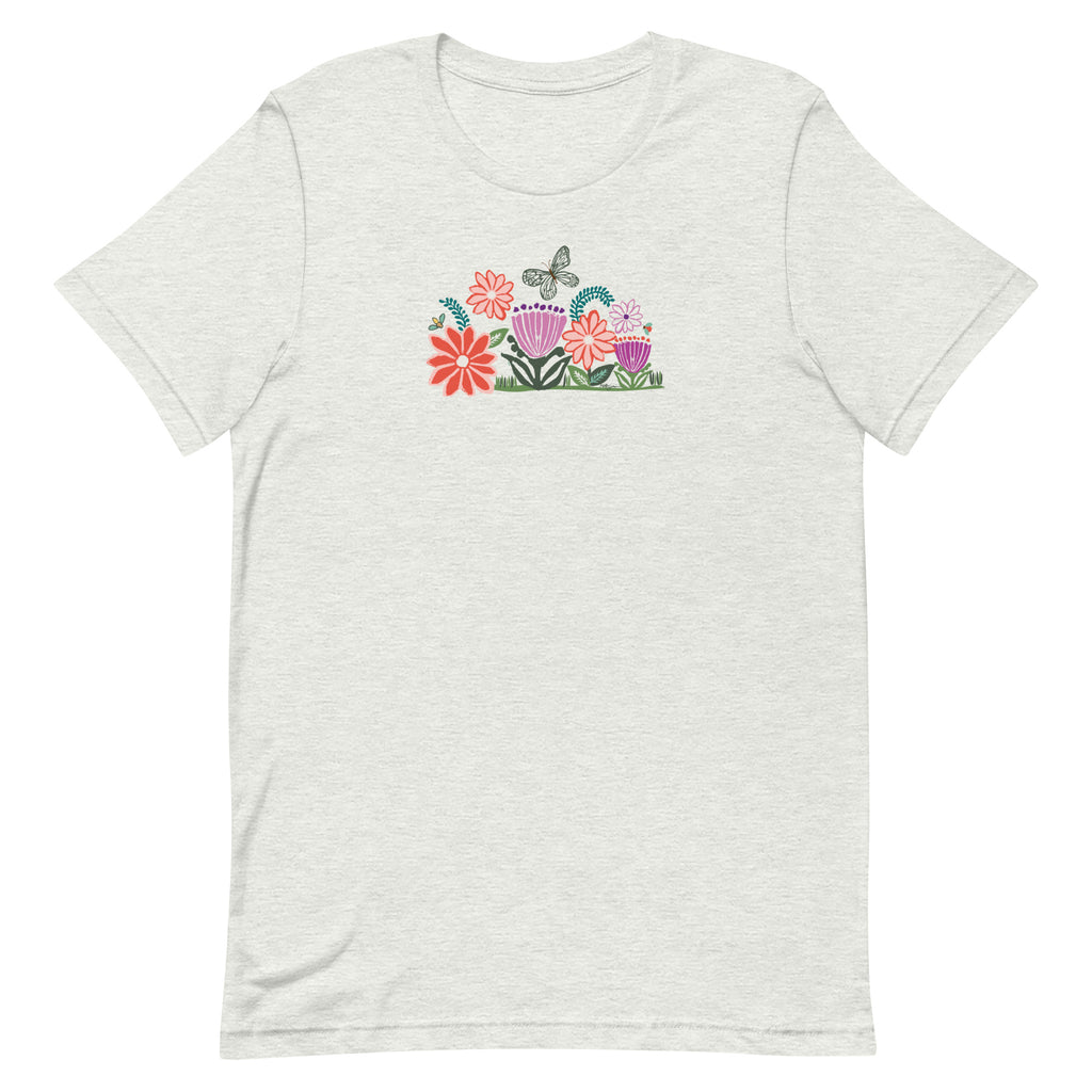 Bloom woodblock-style flowers with a butterfly, ladybug and bee on a t-shirt in ash, front view – Kate Spain design