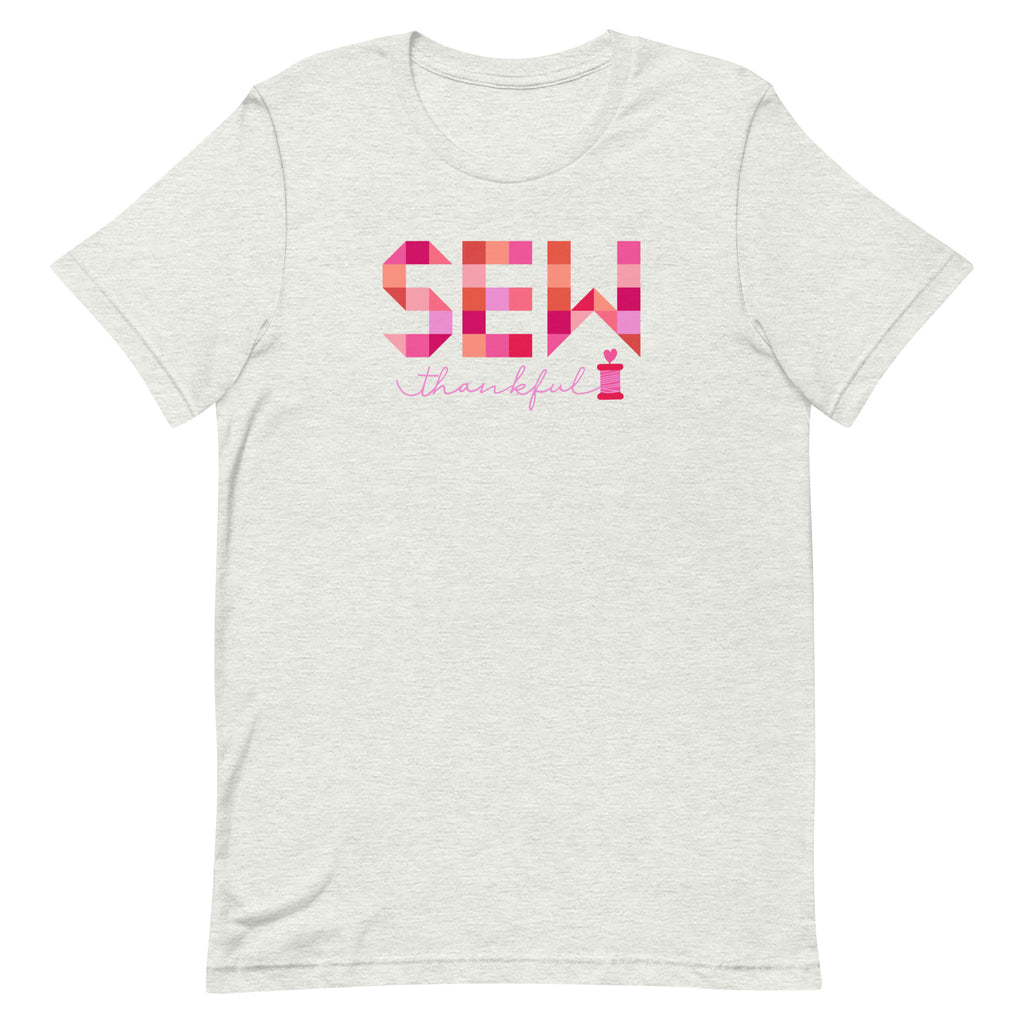 Sew Thankful patchwork lettering with a heart-topped thread spool on a t-shirt in ash, front view – Kate Spain design for Pat Sloan