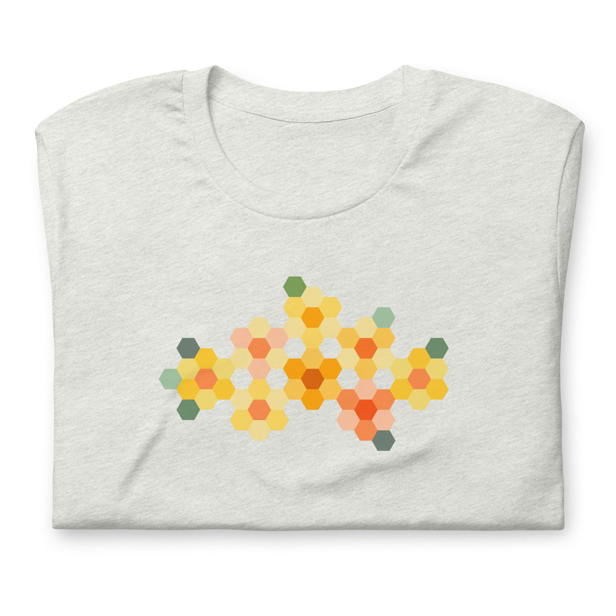 Yellow GeoFlora hexagon flowers in golden yellow, orange, coral and sage on a t-shirt in ash, folded close-up of the design – Kate Spain design for Pat Sloan