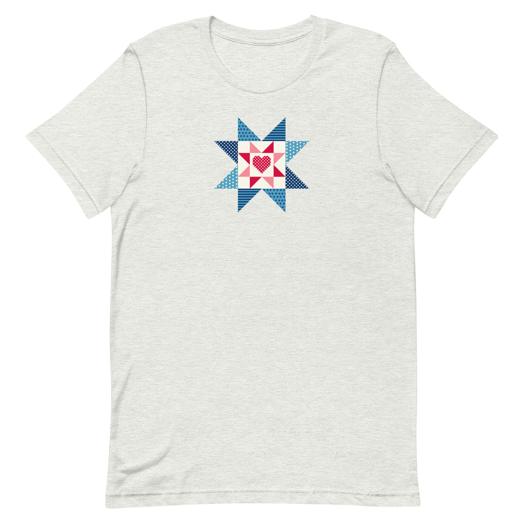 Liberty Love star quilt block with a heart in red, white and blue on a t-shirt in ash, front view – Kate Spain design for Pat Sloan