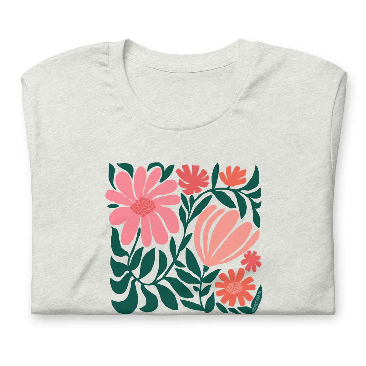 Botanica modern floral design with pink and coral blooms on a t-shirt in ash, folded close-up of the design – Kate Spain design