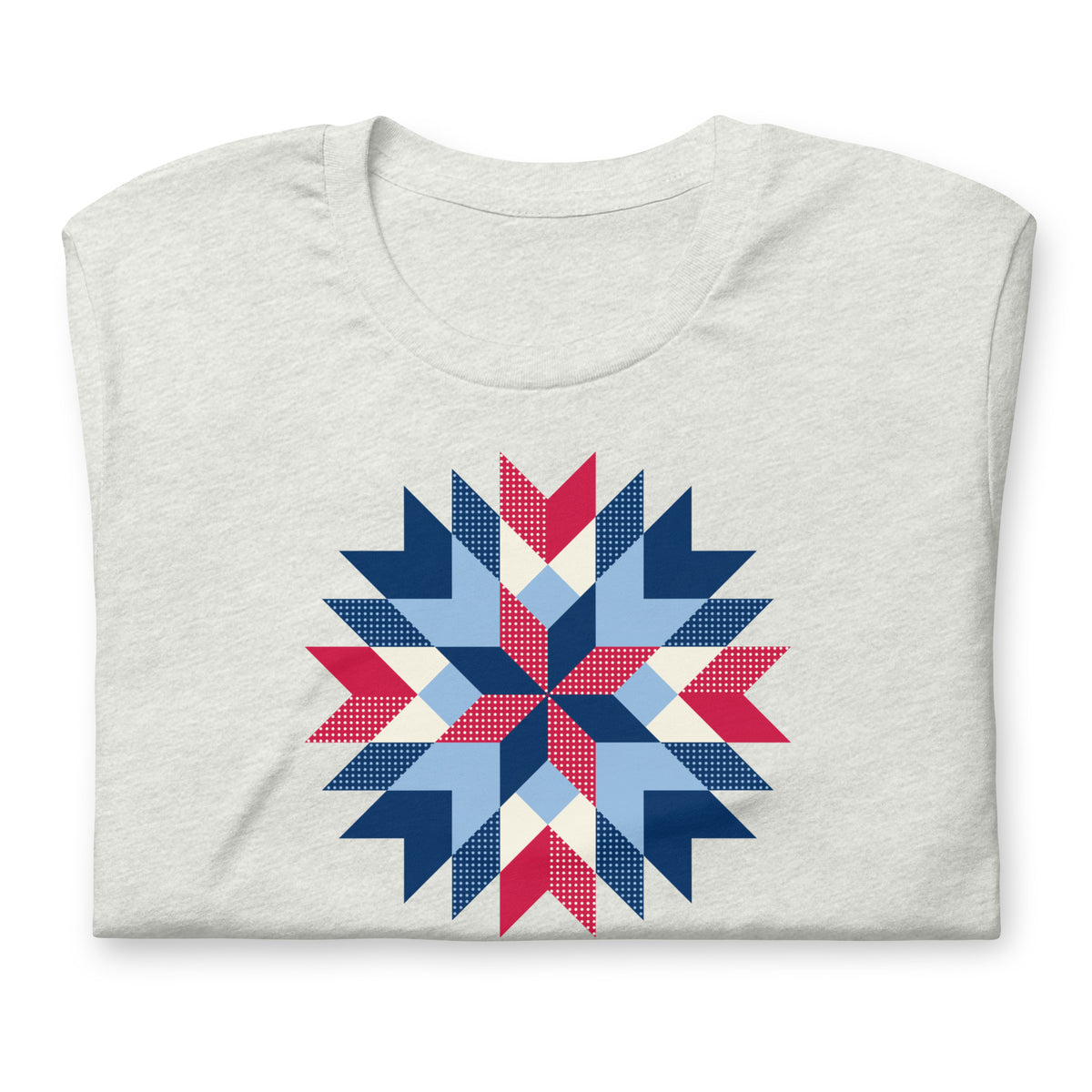 Barn Star quilt block in red, white and blue on a staple t-shirt in ash, folded close-up of the design – Kate Spain design for Pat Sloan