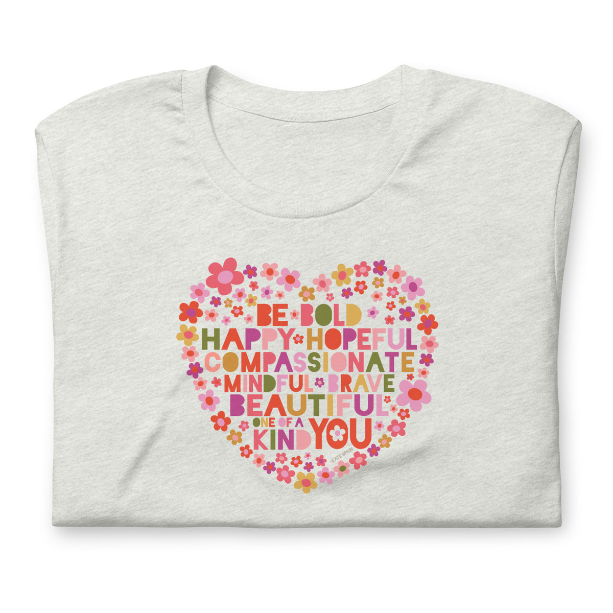 Be You floral heart of inspirational words on a staple t-shirt in ash, folded close-up of the design – Kate Spain design