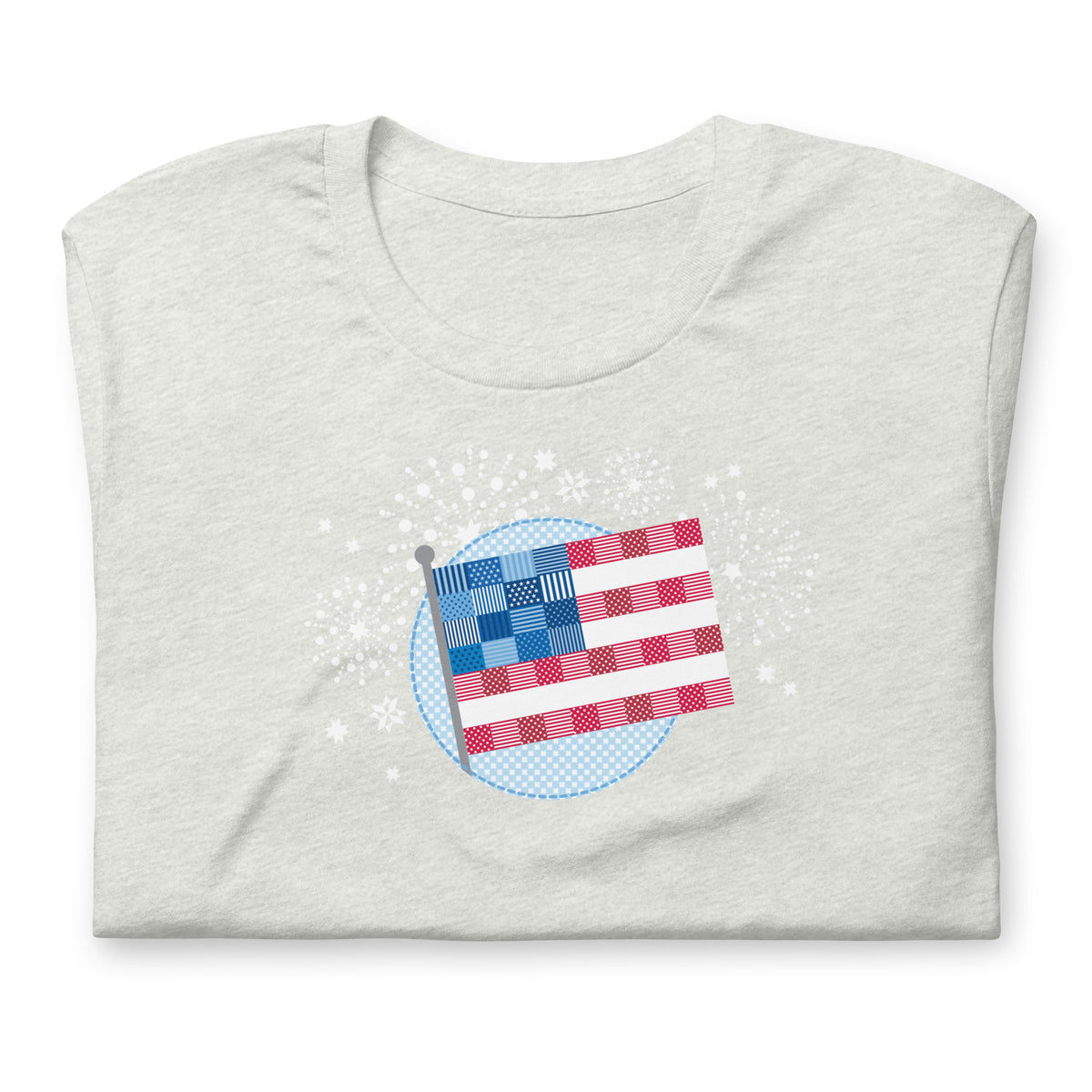 Patchwork Flag quilt-style flag with fireworks on a staple t-shirt in ash, folded close-up of the design – Kate Spain design for Pat Sloan
