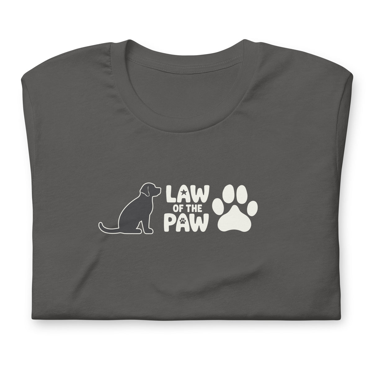Law of the Paw® logo with seated dog and paw print on a t-shirt in asphalt, folded close-up of the design – Kate Spain design